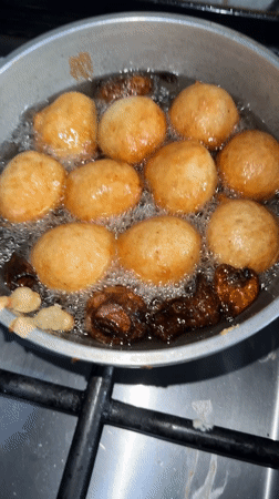 Morning cooking scene documented in Sabon Tasha, Nigeria