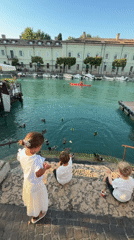Summer evening along the canals of Peschiera del Garda