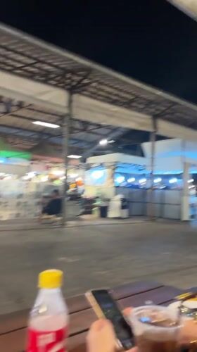 Diner enjoys meal at Bangkok night market