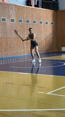 Woman practices tennis at early morning session in Chaikovsky
