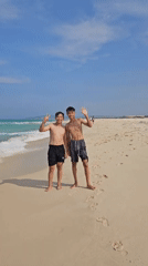 Young men enjoy morning beach time in Vietnam