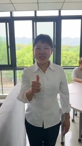 Students film informal video content in Jiangjin common room
