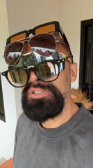 Multiple pairs of stacked sunglasses, Ko Samui