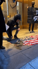 Protesters demonstrate at NYC federal building, burn flag