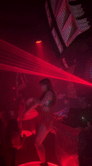 Nightclub performer dances on platform in North Kuta