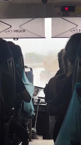 Heavy rain hits Yanychi as bus passengers travel