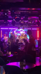 Nightclub celebration observed in Dubai with dynamic lighting