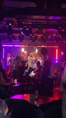 Nightclub celebration observed in Dubai with dynamic lighting