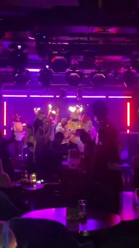 Nightclub celebration observed in Dubai with dynamic lighting