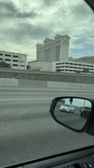 Driver passes Caesars Palace on Las Vegas highway