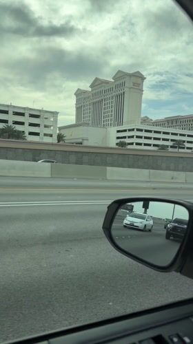 Driver passes Caesars Palace on Las Vegas highway