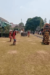 Traditional costume performance and gamelan music in Demak, Indonesia