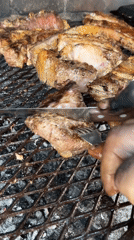 Outdoor beef barbecue observed in Merlo, Argentina
