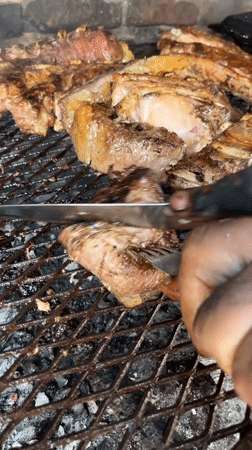Outdoor beef barbecue observed in Merlo, Argentina