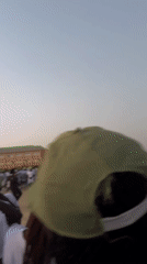 Young adults in uniform gather for outdoor activity in Maiduguri