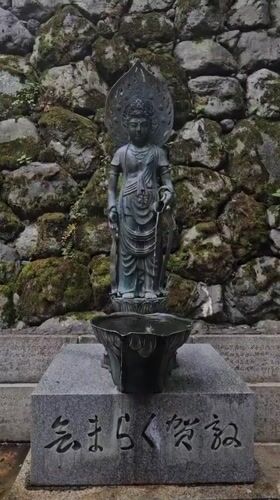 Early morning documentation of Buddhist statues and railway in Kyoto
