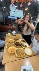 Diners photograph food at Davao City restaurant