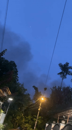 Davao City resident documents cooking, utilities during smoky morning