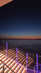 Sunset captured from elevated sea vantage point near Italian coast