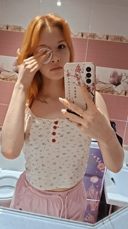 Woman takes bathroom selfies in Chaikovsky, Russia