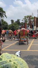 Morning traffic scene recorded from motorbike in Dhaka