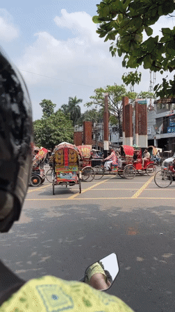 Morning traffic scene recorded from motorbike in Dhaka