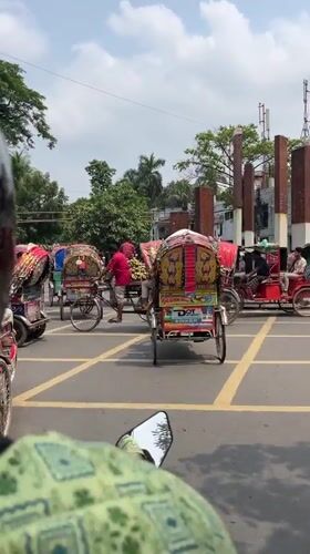 Morning traffic scene recorded from motorbike in Dhaka