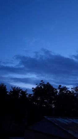 Ukrainian resident documents daily life through sunset and pets
