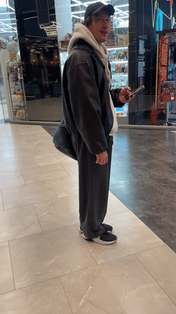 Mall visitor browsed displays while walking through Murino shopping center