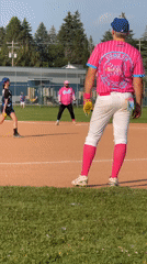 Pink-uniformed baseball game on a Calgary summer evening