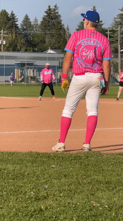 Pink-uniformed baseball game on a Calgary summer evening
