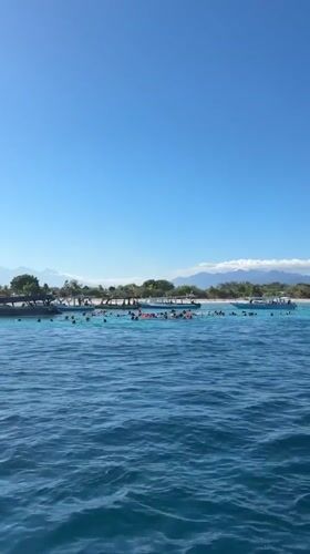 Oseana Adventure boat anchored in turquoise Lombok waters