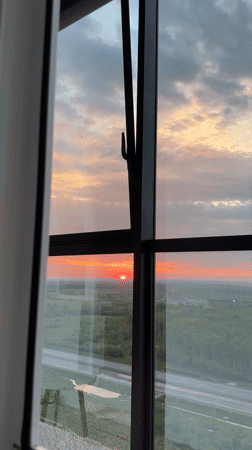 Vivid red sunset observed from high-rise in St Alakul'