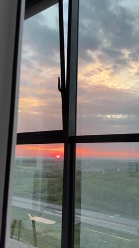Vivid red sunset observed from high-rise in St Alakul'