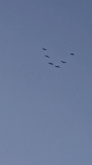 Birds and sunset clouds over Latvia on a late summer evening