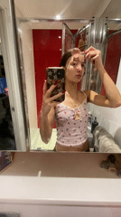 Woman takes selfies in London bathroom Monday evening