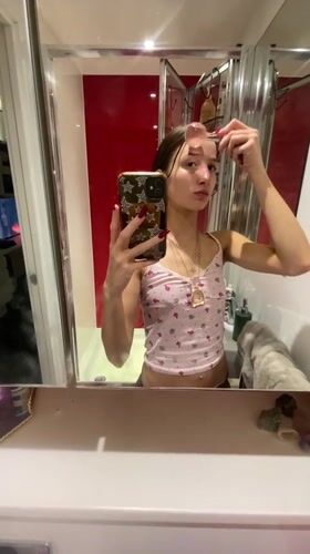 Woman takes selfies in London bathroom Monday evening