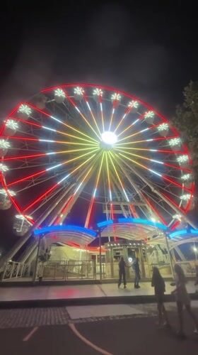 Burgas Sea Garden Ferris wheel glows through a full LED cycle