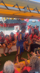 Tourist catamaran entertainment captured in Venezuelan coastal town