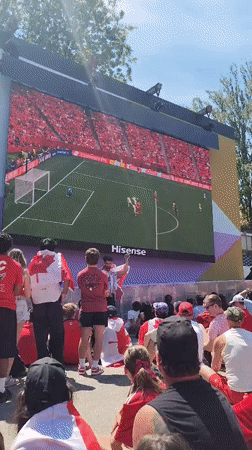 Outdoor fan zone crowd watches Switzerland lead Canada 1-0