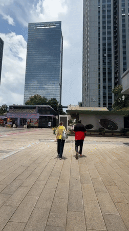 Street-level scenes around a Huizhou commercial plaza
