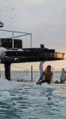 Beachside foam party draws young revelers in Indonesia