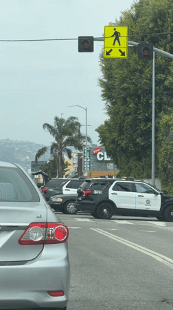 LAPD vehicles block Los Angeles intersection Thursday evening