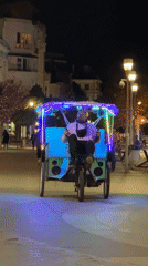 LED-lit pedicab entertains evening crowds in Varna squares