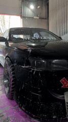 Black sports car washed at Khimki facility