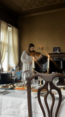 Woman plays violin in Saint Petersburg dining room