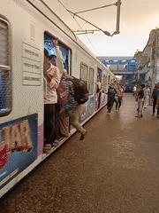 Mumbai's midday rush: packed trains, crowded platforms, gridlocked streets