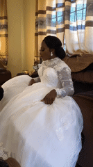Bride photographed during wedding preparations in Bukuru, Nigeria