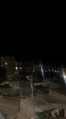Evening scenes captured in Yeghegnadzor show residential buildings, violet plants