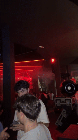 Turin nightclub scene captured with dynamic lighting effects